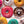 Load image into Gallery viewer, 150 piece mini micro jigsaw puzzle depicting colorful donuts icing sugar
