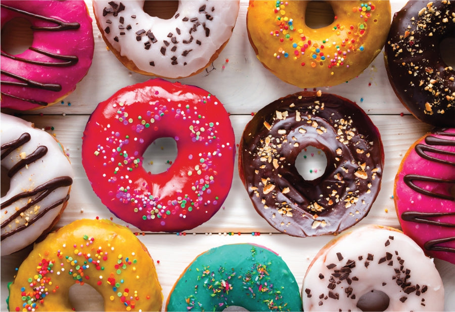 150 piece mini micro jigsaw puzzle depicting colorful donuts icing sugar